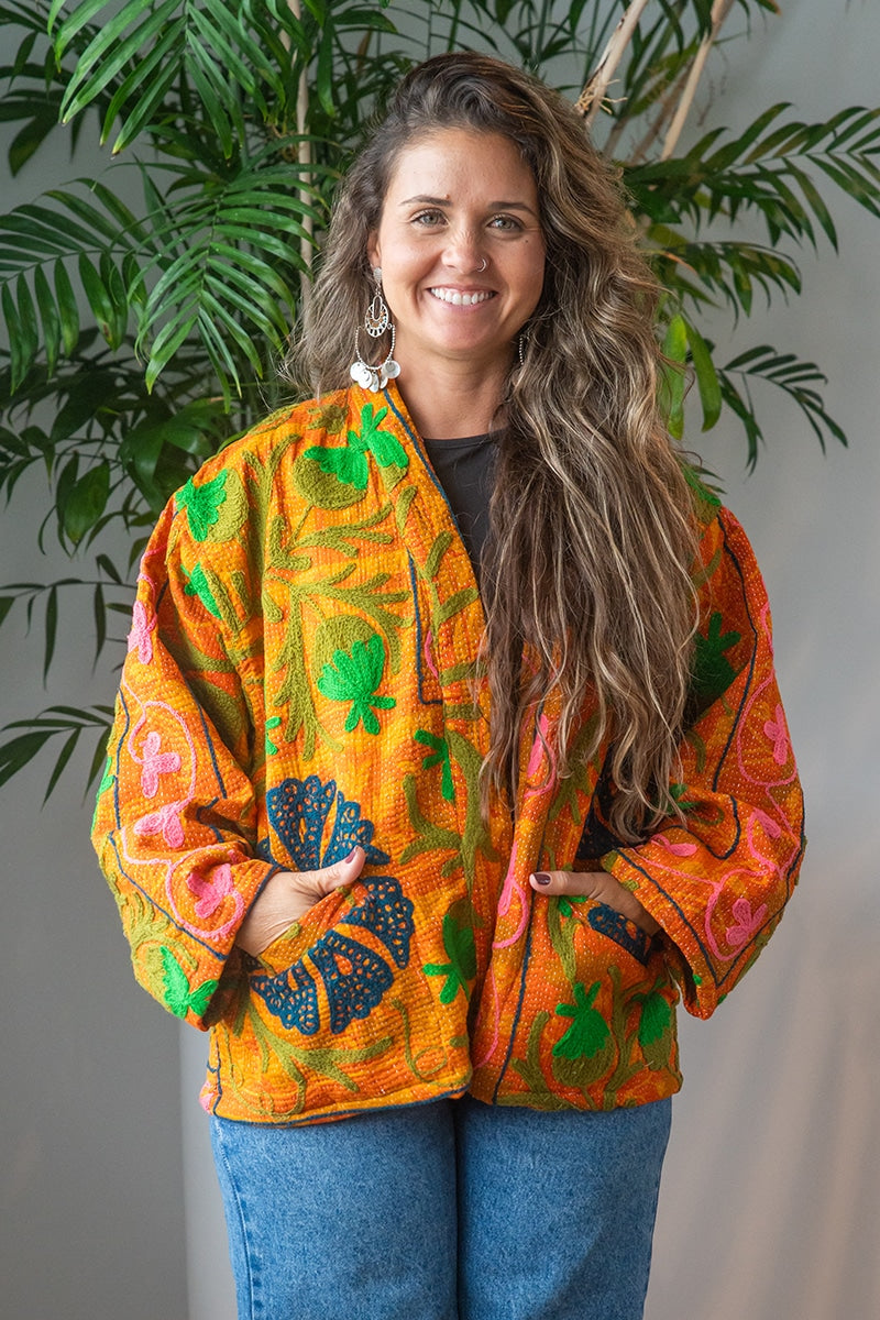 Womens Elysian Kantha Jacket, with traditional Suzani embroidery, handmade from recycled Vintage Kantha’s. Saffron orange