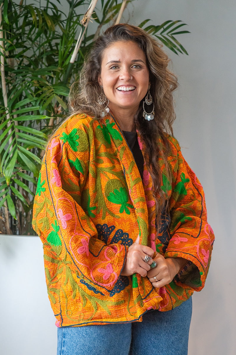Womens Elysian Kantha Jacket, with traditional Suzani embroidery, handmade from recycled Vintage Kantha’s. Saffron orange