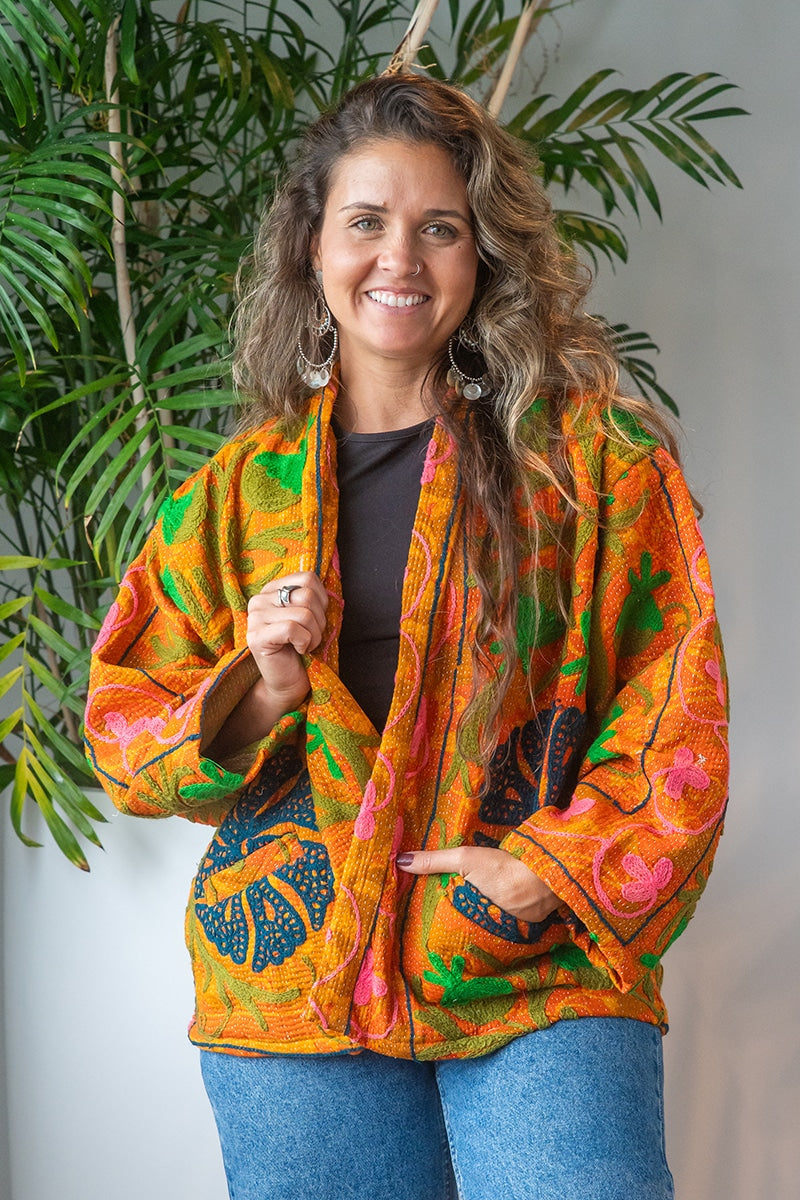 Womens Elysian Kantha Jacket, with traditional Suzani embroidery, handmade from recycled Vintage Kantha’s. Saffron orange