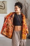Womens Kumud Kantha Jacket, with traditional Suzani embroidery, handmade from recycled Vintage Kantha’s. Gold & Maroon Tashi.