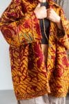 Womens Kumud Kantha Jacket, with traditional Suzani embroidery, handmade from recycled Vintage Kantha’s. Gold & Maroon Tashi.